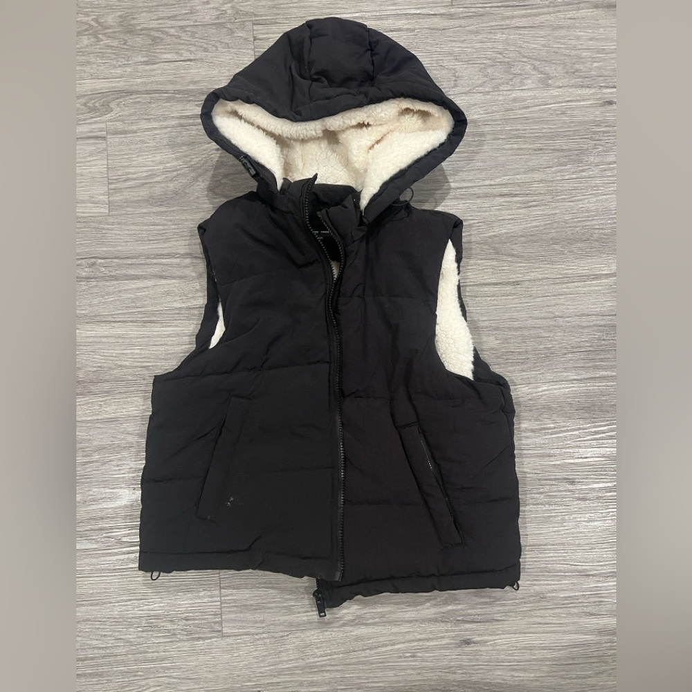 Black hooded vest